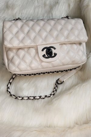 Designed in premium cream leather bag